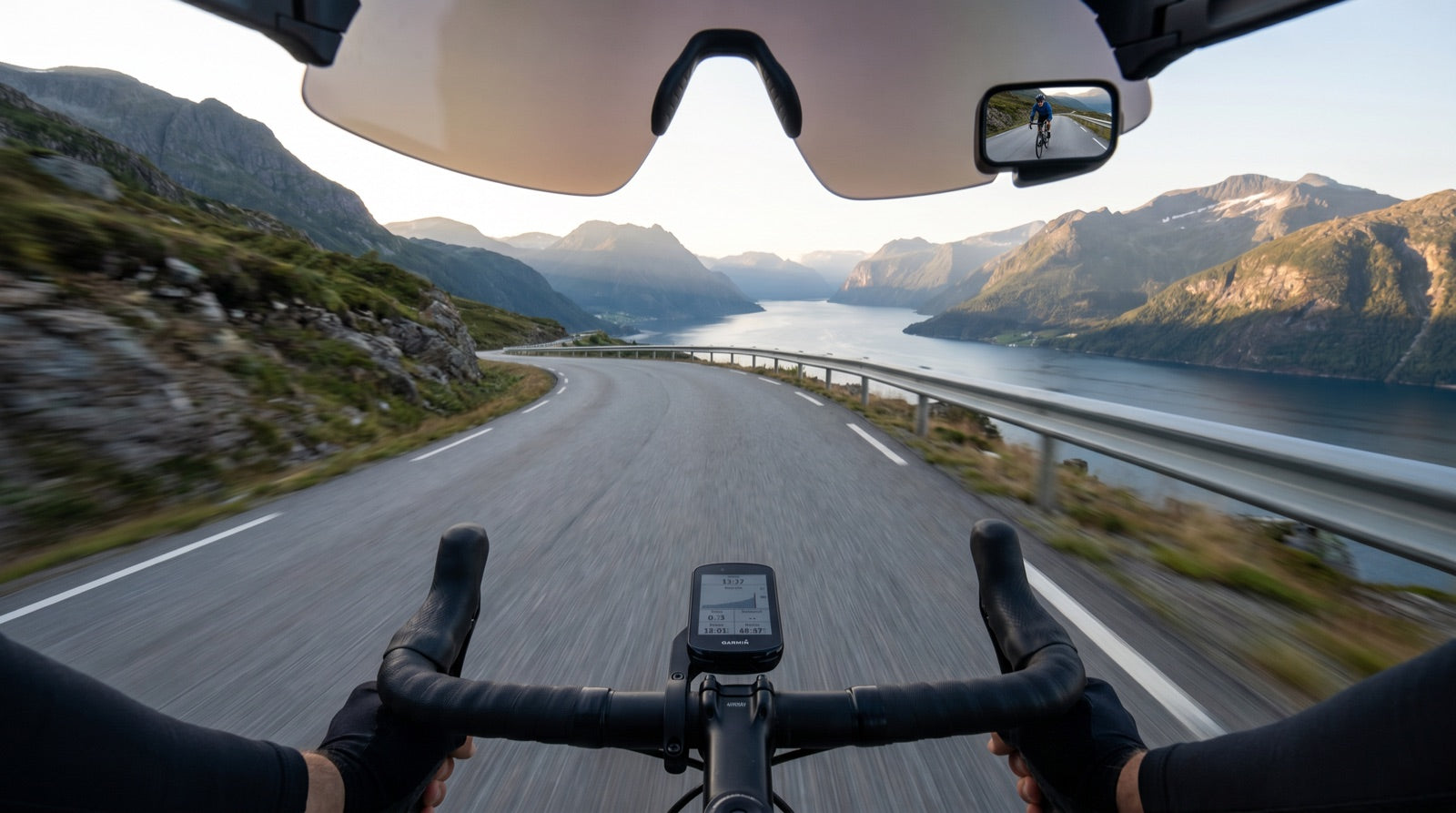 Cyclist's point-of-view through TriEye eyewear, looking ahead at a Norwegian fjord road with another cyclist clearly visible in the integrated rear-view mirror